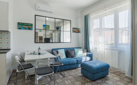 Brezza sul Mare: Furniture, Interior Design, Flooring, Floor, Couch, Room, Ceiling, Living Room, Apartment, Table