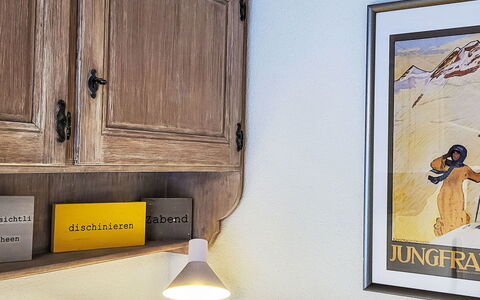 Apartment Mila: Wood, Interior Design, Cabinetry, Wood Stain, Cupboard, Room, Light Fixture, Kitchen, Hardwood, Shelving