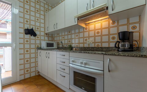 Balandro: Kitchen, Kitchen Appliance, Countertop, Major Appliance, Flooring, Wood, Interior Design, Floor, Cabinetry, Kitchen Stove