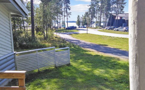 Kulta-Käkönen 2 by Bomba: Lawn, Shade, Yard, Landscaping, Driveway, Walkway, Siding, Backyard