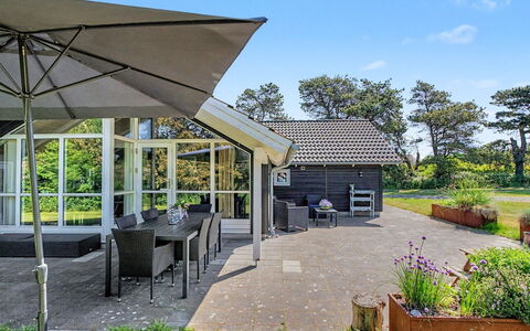 Gudrid - 550M from the Sea: Roof, Shade, Garden, Cottage, Estate, Landscaping, Outdoor Structure, Yard, Chair, Design