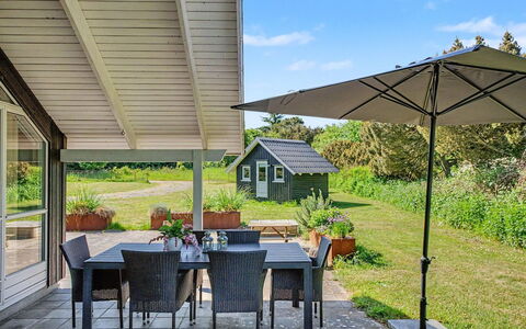 Gudrid - 550M from the Sea: Furniture, Chair, Roof, Outdoor Furniture, Shade, Kitchen & Dining Room Table, Outdoor Table, Garden, Porch, Cottage