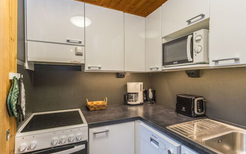 Levin Ainola: Kitchen Appliance, Kitchen, Countertop, Major Appliance, Cabinetry, Furniture, Interior Design, Kitchen Stove, Flooring, Wood