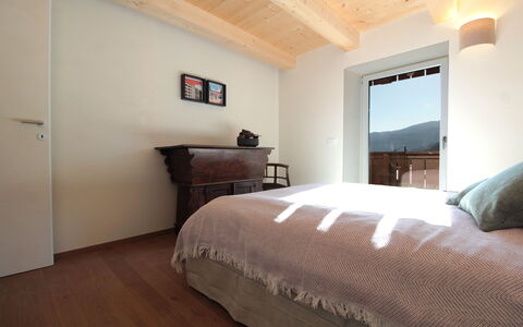 Casa Tomà Mountain View Cortina: Furniture, Interior Design, Bedroom, Bed, Flooring, Wood, Floor, Bed Sheet, Bedding, Ceiling