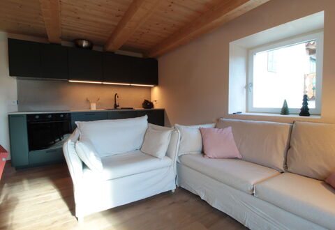 Casa Tomà Mountain View Cortina: Furniture, Flooring, Interior Design, Floor, Couch, Wood, Room, Wood Flooring, Living Room, Table