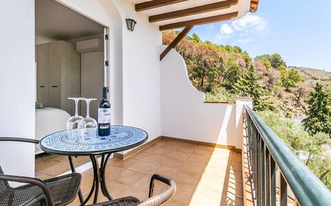 Hacienda Competa: Apartment, Balcony, Wood Stain, Chair, Handrail, Villa, Hardwood, Eco Hotel, Hotel, Houseplant