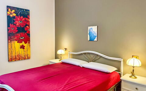 Carlui: Bed, Bedroom, Interior Design, Furniture, Bed Sheet, Bedding, Floor, Flooring, Room, Ceiling
