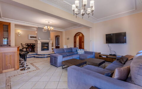 Nara: Interior Design, Furniture, Flooring, Floor, Couch, Ceiling, Room, Living Room, Lighting, Apartment