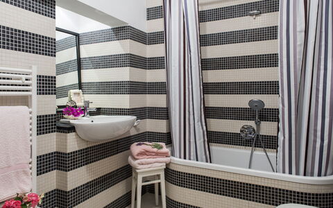Portofino: Interior Design, Bathroom, Plumbing Fixture, Textile, Flooring, Floor, Plumbing, Toilet, Room, Tile