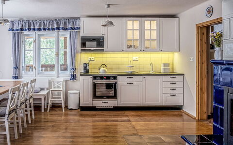 Na Stráni: Kitchen, Wood, Furniture, Interior Design, Countertop, Flooring, Room, Kitchen Appliance, Floor, Major Appliance