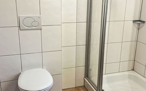 Haus 104 - Seepark Burhave: Flooring, Floor, Bathroom, Tile, Plumbing Fixture, Room, Toilet, Plumbing, Toilet Seat