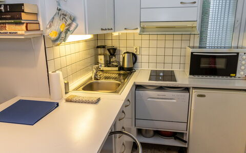 Korpilammenhuvilat 7A: Kitchen Appliance, Kitchen, Countertop, Major Appliance, Kitchen Sink, Sink, Plumbing Fixture, Cabinetry, Kitchen Stove, Stove