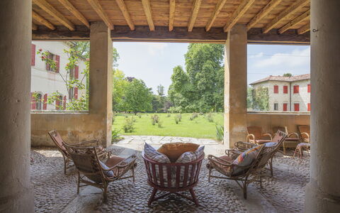 Jasmine Villa: Architecture, Garden, Lawn, Hacienda, Shade, Yard, Outdoor Furniture, Backyard, Chair, Column
