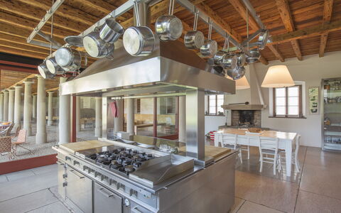 Jasmine Villa: Kitchen, Ceiling, Interior Design, Furniture, Countertop, Light Fixture, Kitchen Appliance, Cabinetry, Kitchen & Dining Room Table, Home Appliance