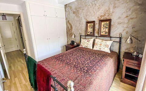 Enola: Furniture, Bed, Interior Design, Bedroom, Bedding, Wall, Bed Sheet, Floor, Flooring, Room