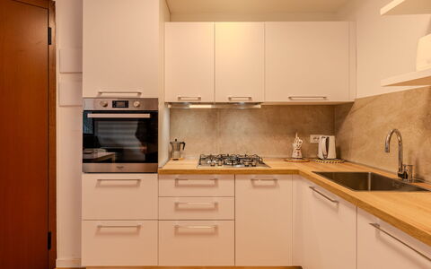 Le Busatte: Kitchen, Kitchen Appliance, Countertop, Major Appliance, Cabinetry, Flooring, Wood, Interior Design, Stove, Furniture