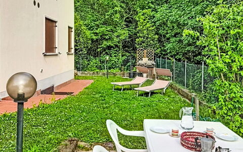 Le Busatte: Garden, Outdoor Table, Lawn, Backyard, Outdoor Furniture, Chair, Yard, Shade, Landscaping, Kitchen & Dining Room Table