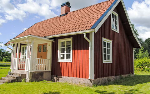 Torpet i Småland: Furniture, Shade, Porch, Chair, Outdoor Furniture, Outdoor Structure, Eco Hotel, Balcony, Pergola, Deck