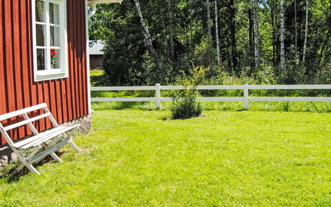 Torpet i Småland: Furniture, Shade, Porch, Chair, Outdoor Furniture, Outdoor Structure, Eco Hotel, Balcony, Pergola, Deck