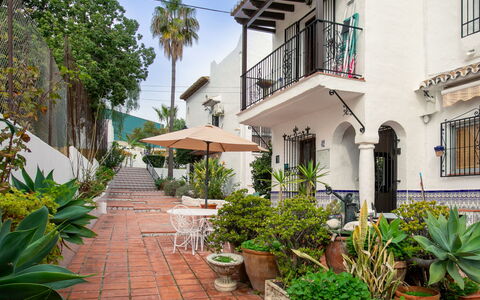 Nerja Beach Center: Flowerpot, Balcony, Door, Houseplant, Hacienda, Courtyard
