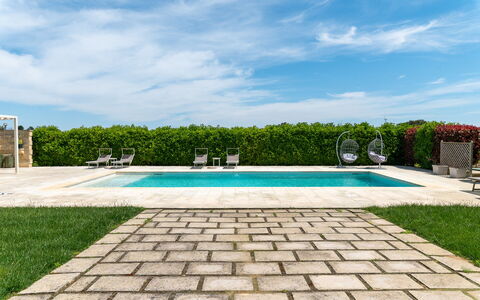 Masseria Ficalindia: Blue, Swimming Pool, Garden, Composite Material, Outdoor Furniture, Leisure, Resort, Landscaping, Shade, Water Feature