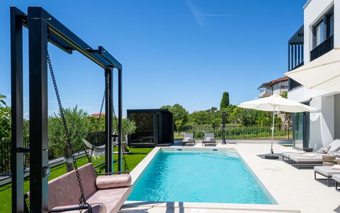 Loparia: Swimming Pool, Leisure, Composite Material, Outdoor Furniture, Resort, Shade, Eco Hotel, Landscaping, Estate, Villa