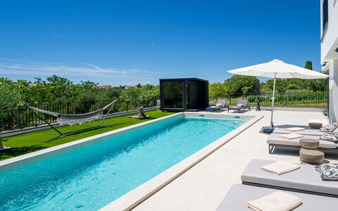 Loparia: Swimming Pool, Water, Resort, Outdoor Furniture, Leisure, Composite Material, Eco Hotel, Shade, Landscaping, Water Feature