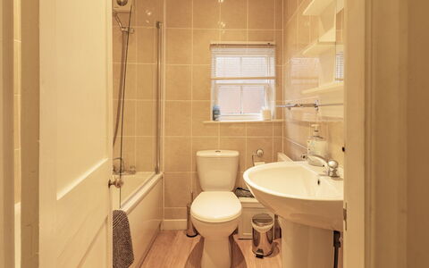 Robins Nest: Toilet Seat, Bathroom, Toilet, Plumbing Fixture, Bathroom Sink, Flooring, Wall, Sink, Floor, Interior Design