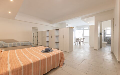 Appartamento Monomare, Gallipoli: Floor, Flooring, Interior Design, Ceiling, Wood, Furniture, Room, Bedroom, Bed, Apartment