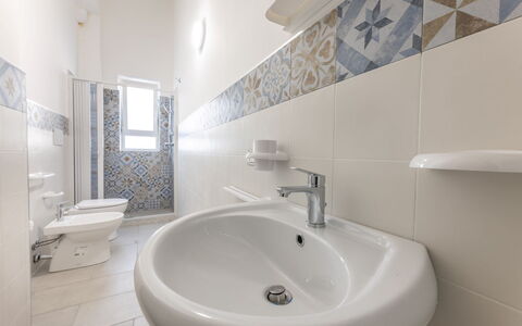 Appartamento Monomare, Gallipoli: Flooring, Floor, Interior Design, Tile, Plumbing Fixture, Ceiling, Bathroom, Room, Sink