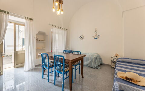 Casa Marinella, Marina di Mancaversa: Flooring, Floor, Ceiling, Interior Design, Furniture, Room, Chair, Hall, Tile