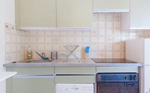 Les Jardins du Soleil: Kitchen, Kitchen Appliance, Countertop, Major Appliance, Cabinetry, Flooring, Interior Design, Kitchen Sink, Floor, Home Appliance