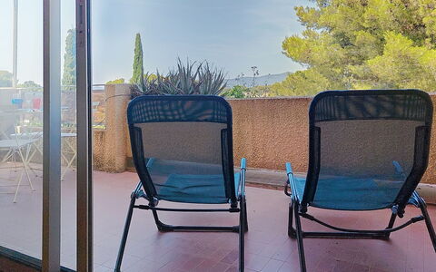 Les Jardins du Soleil: Furniture, Chair, Outdoor Furniture, Outdoor Table, Shade, Folding Chair, Balcony, Wood Stain, Coffee Table, Eco Hotel