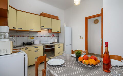 Villa Rita: Interior Design, Furniture, Flooring, Kitchen Appliance, Floor, Kitchen, Countertop, Room, Major Appliance, Ceiling