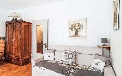 Catherine: Furniture, Interior Design, Flooring, Couch, Wall, Floor, Wood, Room, Living Room, Lighting