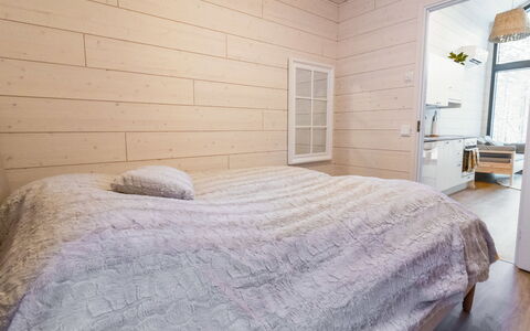 Soutaja Lodge: Flooring, Wood, Floor, Wood Flooring, Bedroom, Interior Design, Ceiling, Bed, Room, Hardwood