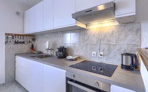 Majoli: Kitchen Appliance, Kitchen, Countertop, Major Appliance, Cabinetry, Home Appliance, Kitchen Stove, Flooring, Kitchen Sink, Interior Design