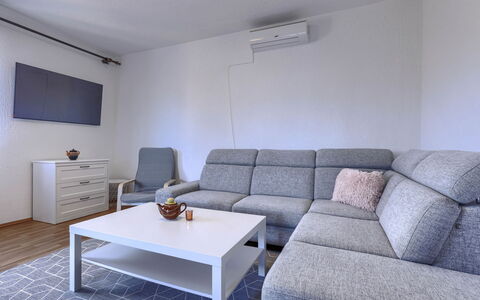 Majoli: Furniture, Flooring, Floor, Interior Design, Couch, Apartment, Living Room, Room, Home