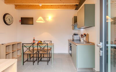 Alture e Riflessi 132.1: Interior Design, Furniture, Flooring, Wood, Ceiling, Floor, Countertop, Room, Lighting, Kitchen