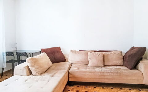 Livia: Furniture, Flooring, Floor, Wood, Interior Design, Couch, Living Room, Cushion, Room, Comfort