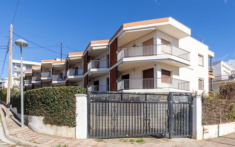 Delfines: Residential Area, Facade, Neighbourhood, Apartment, Balcony, Human Settlement, Urban Design, Home, Mixed-Use, Condominium