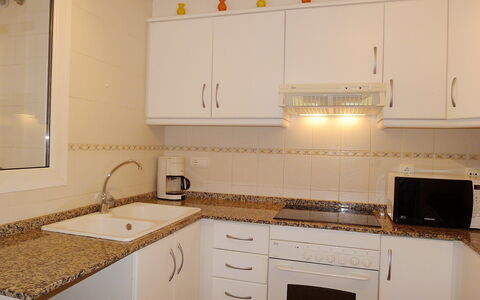 Altea Dorada: Countertop, Room, Property, Kitchen, Furniture, Cabinetry, Interior Design, Building, Tile, Sink