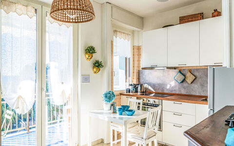 Bella Vista sul Mare: Furniture, Interior Design, Flooring, Wood, Floor, Chair, Room, Lighting, Kitchen, Home