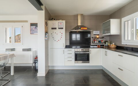 Sa Blanca: Kitchen, Countertop, Kitchen Appliance, Interior Design, Flooring, Cabinetry, Furniture, Major Appliance, Ceiling, Floor