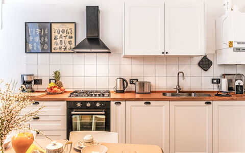 Casa Dea Diana: Kitchen Appliance, Kitchen, Countertop, Major Appliance, Kitchen Stove, Cabinetry, Interior Design, Stove, Gas Stove, Wood