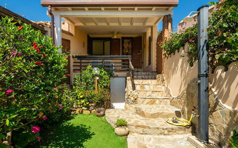 Casetta nel Blu: Shrub, Garden, Home, Landscaping, Shade, Yard, Backyard, Balcony, Stairs