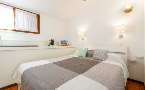 Casetta nel Blu: Bed, Furniture, Interior Design, Bedroom, Wall, Floor, Flooring, Ceiling, Wood, Room