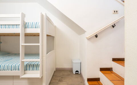 Casetta nel Blu: Interior Design, Floor, Flooring, Room, Furniture, Home, Ceiling, Bedroom, Bunk Bed, Apartment