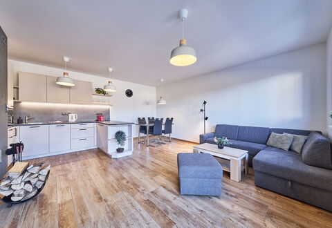 Sunny Terrace Oasis: Flooring, Interior Design, Furniture, Wood, Floor, Ceiling, Room, Couch, Lighting, Living Room
