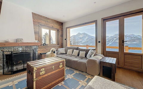Chalet Shangri-La: Furniture, Living Room, Ceiling, Couch, Hardwood, Chair, Plank, Wood Flooring, Glacial Landform